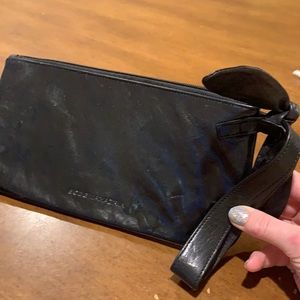 EUC BCBG MAXAZRIA black smooth leather clutch flower accent with wristlet strap